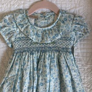 Brand new blue floral dress with tags and never worn.